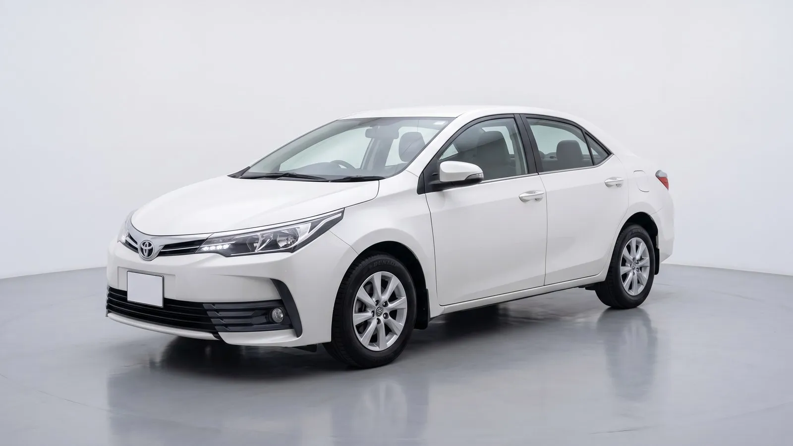 Toyota Corolla GLi automatic sedan, entry price car rental with driver in Karachi
